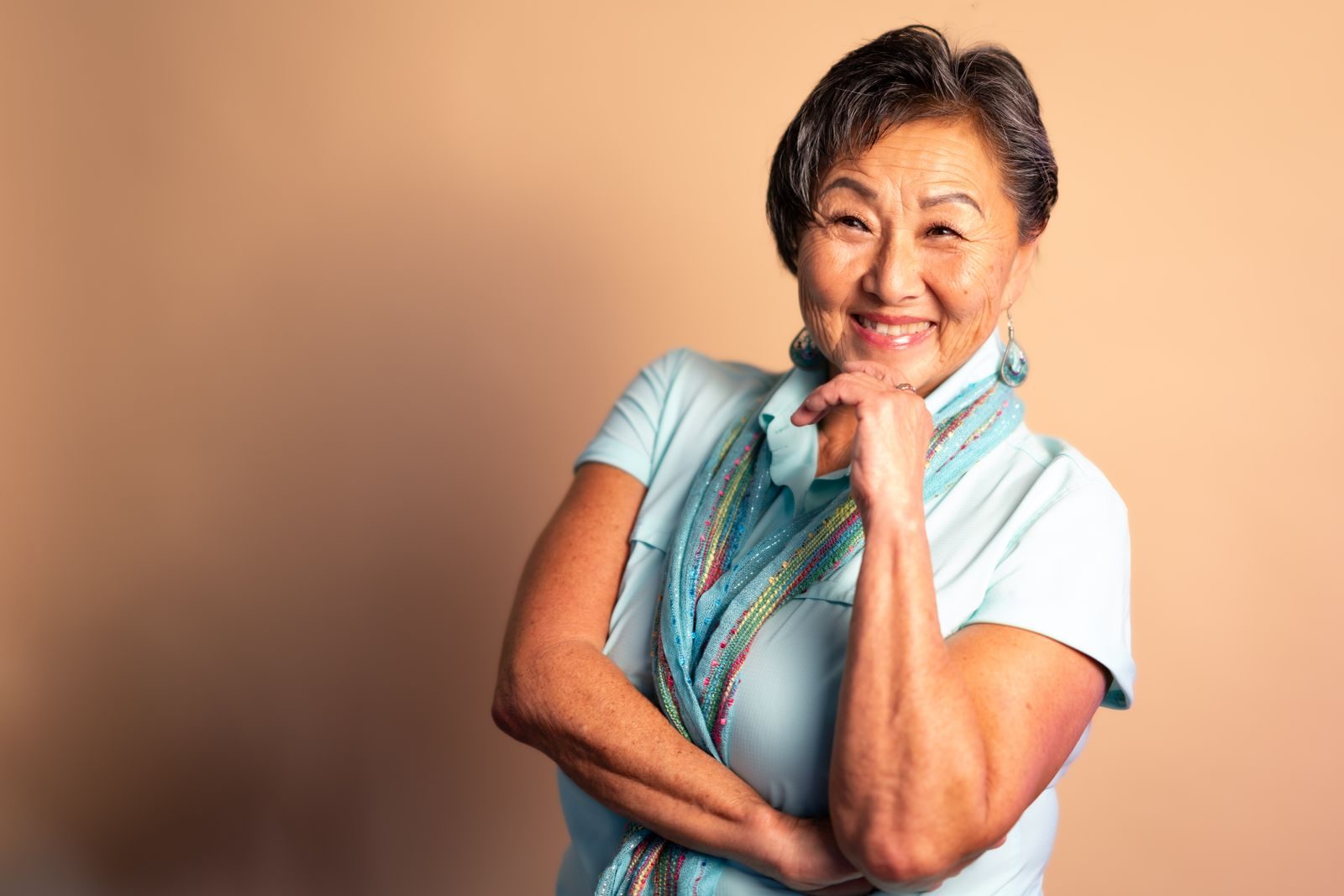 Portrait of a joyful senior woman in Sanford, Florida, showcasing elegance and confidence.