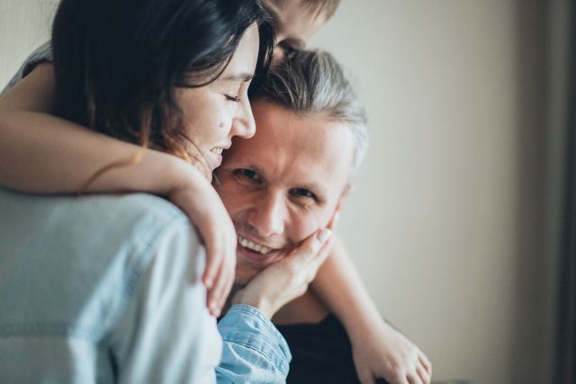 A joyful family moment showing love and togetherness indoors.